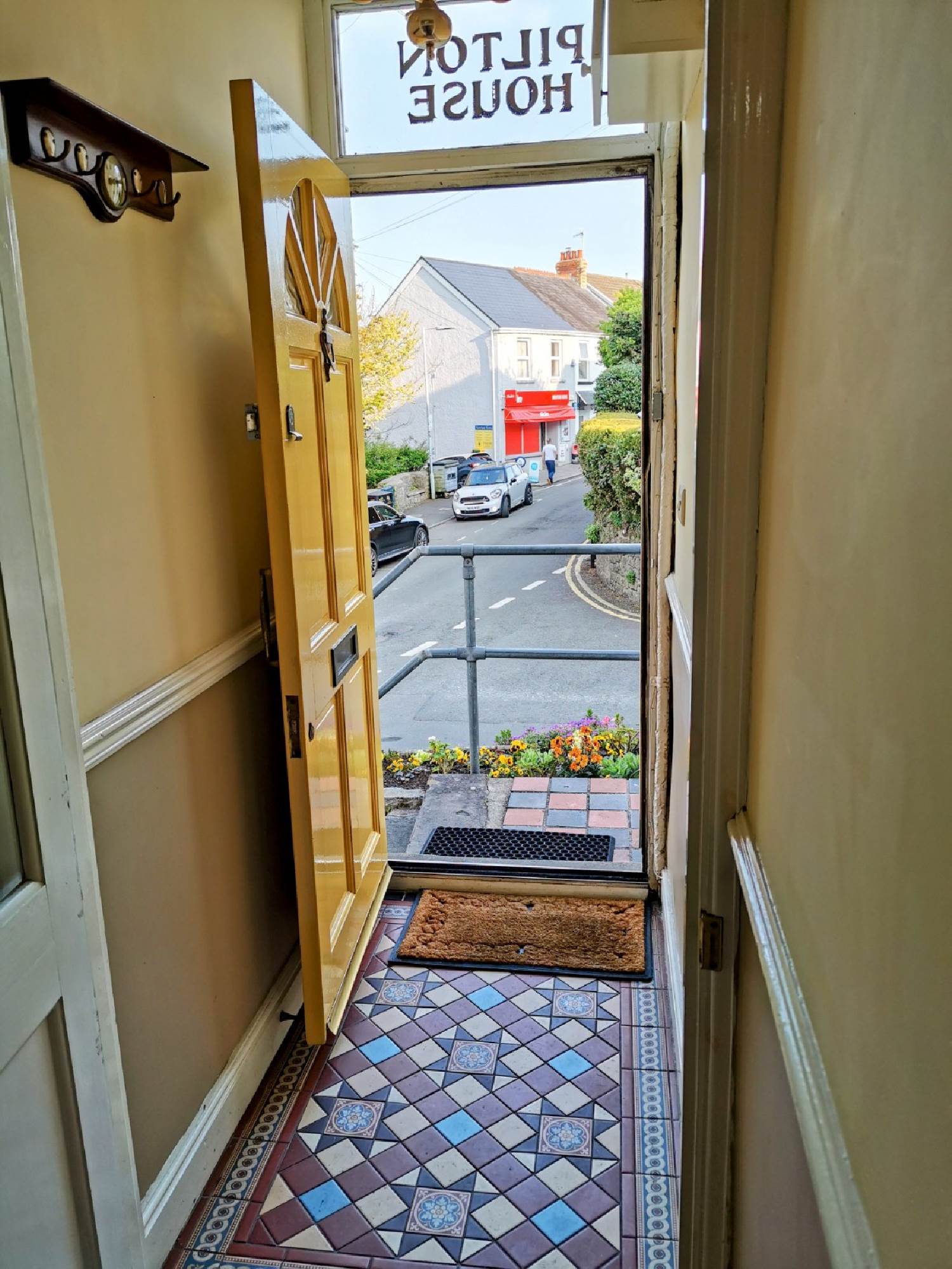 Welcome to Pilton House Gower and its front porch with encaustic tiled floor