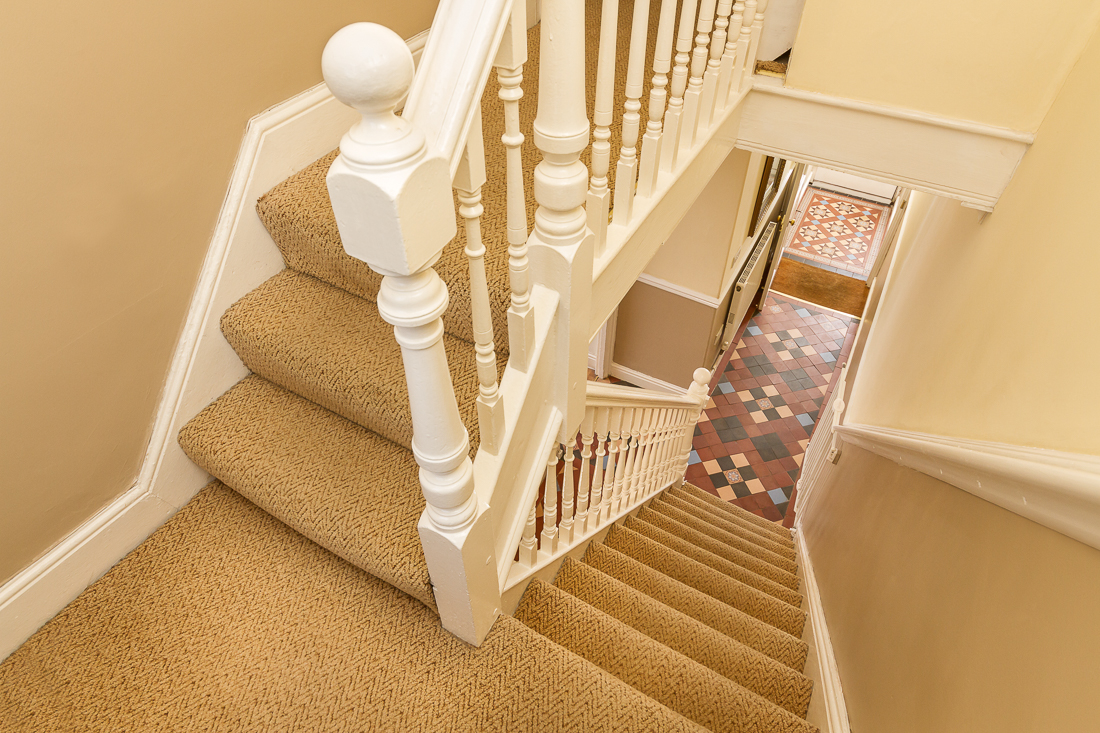 Staircase in Pilton House Gower leading down from the bedrooms to the Ground Floor area